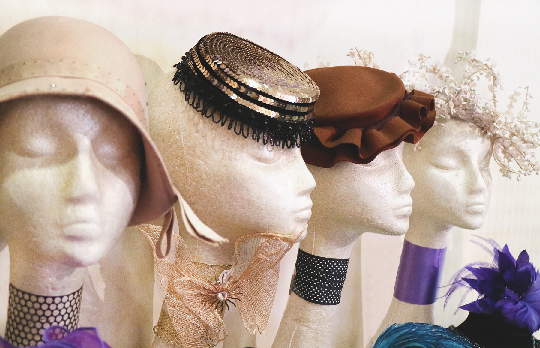 Hats by the Feathered Head